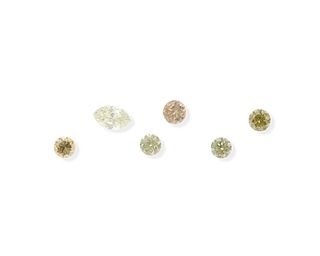 Six unmounted natural colored diamonds