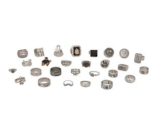 A large group of silver rings
