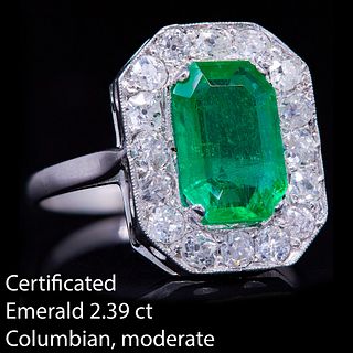 IMPORTANT 2.39 CT. COLOMBIAN EMERALD AND DIAMOND CLUSTER RING