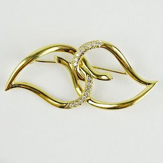 Tiffany & Co 18 Karat Yellow Gold and Diamond Swirl Pin.