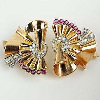 Pair of Lady's Retro 1940's Round Cut Diamond, Ruby and 14 Karat Rose Gold Earrings.