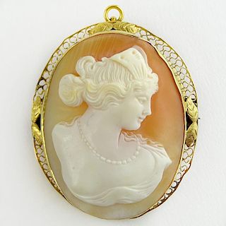 Lady's Vintage Carved Shell Cameo and 14 Karat Yellow Gold Pendant Brooch.