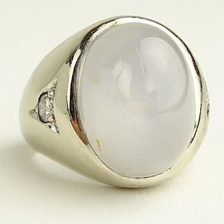 Man's Large Cabochon Blue Star Sapphire and 14 Karat White Gold Ring