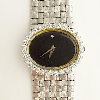 Lady's Vintage Ebel 18 Karat White Gold, Diamond, 17 Jewel Watch with Sapphire Stem and 14 Karat White Gold Finely Woven Mesh Bracelet.