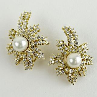 Pair of Lady's Approx. 2.50 Carat Round Cut Diamond, Pearl and 18 Karat Yellow Gold Earrings.