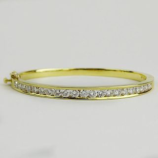 Lady's Approx. 3.0 Carat Round Cut Diamond and 18 Karat Yellow Gold Bangle Bracelet.