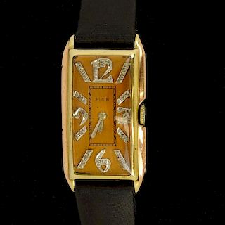 Vintage Elgin 14 Karat Yellow and Rose Gold Manual Movement Tank Watch with Diamond Hour Markers and Leather Strap. Signed 14K to case. Appears to be 