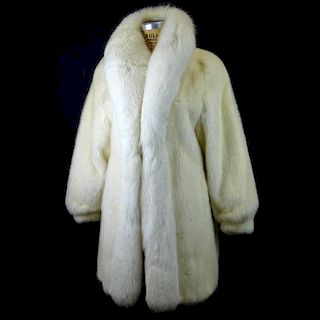 White Mink and White Fox Coat. White Fox Collar and Front, White Mink Body and Sleeves. Very Good Pre Owned Condition. Lined. Measures 36" Long. Acros