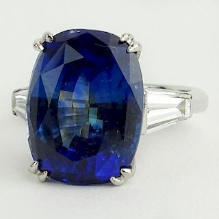 Lady's Fine Quality Approx. 13.20 Cut Cushion Cut Sapphire, .50 Carat Tapered Baguette Cut Diamond and Platinum Ring.