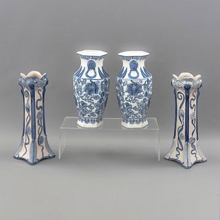 Lote de 4 floreros. China, SXX. Elaborados en porcelana y cerámica. Decorados con motivos orgánicos y florales.