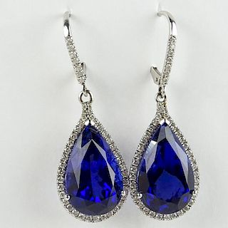 Pair of Lady's Fine Quality Approx. 26.0 Carat Pear Shape Tanzanite, 1.25 Carat Diamond and 14 Karat White Gold Earrings.