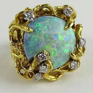 Lady's Vintage White Opal, Round Cut Diamond and 18 Karat Yellow Gold Ring.