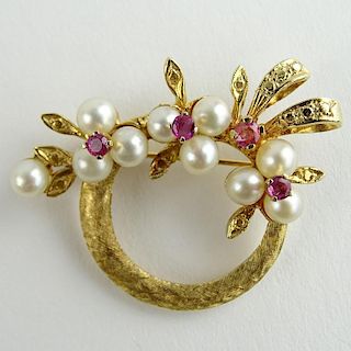 Lady's Vintage 14 Karat Yellow Gold, Round Cut Ruby and Pearl Pendant/Brooch.