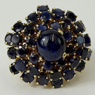 Lady's Vintage Cabochon and Round Cut Sapphire and 14 Karat Yellow Gold Dome Ring.