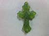 A carved green hardstone crucifix pendant, the treflee form cross with incised edge decoration and s