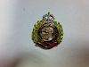 A diamond, demantoid and enamel regimental brooch for the Royal Engineers, the crown and central ini