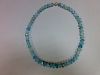 An aquamarine faceted bead necklace, the uniform 9mm faceted beads, individually knotted to a spheri