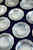A matched set of Twelve George II/III silver pudding plates, (six probably by William Cripps, London