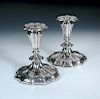 A pair of Victorian silver dwarf candlesticks, by Henry Wilkinson & Co, Sheffield 1849, the lobed ci