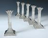 A set of six late Victorian dwarf candlesticks, by Hawksworth, Eyre & Co, Sheffield 1899/1900, each