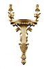 A pair of neo-classical style gilt wood wall brackets, each with twin candle arms and shelf with pal
