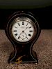 An Edwardian small size tortoiseshell mantle clock, the balloon shape case with 4.5cm (2in) enamel d