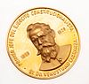 Medalla Cincuentenario del Plan de Guadalupe en oro de 21k. Peso: 42.2 g.