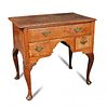 An early 18th century oak lowboy, boxwood line inlaid border decoration, fitted one long and two sho