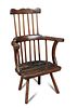 An early 18th century ash and elm comb back chair, the solid seat with straight legs 98 x 62cm (38 x