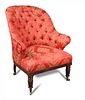 A 19th century mahogany framed barrel back armchair, in the manner of Gillow, upholstered in red dam