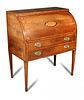 A George III mahogany cylinder bureau, satinwood crossbanded and inlaid with central conch shell and