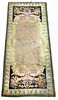 A Savonnerie style green ground rug, 345 x 147cm (135 x 57in) <br. <br>Good colours and good levels