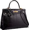 Hermes 35cm Shiny Black Porosus Crocodile Sellier Kelly Bag with Gold Hardware Excellent to Pristine Condition 14" Width x 10" Height x 5" Depth