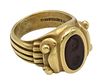 Kieselstein-Cord 18 Karat Gold Ring, set with oval red stone with sun and moon, size 4 3/4, 16 grams.