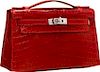 Hermes Shiny Rouge H Nilo Crocodile Kelly Pochette Bag with Palladium Hardware Excellent Condition 8.5" Width x 5" Height x 2.5" Depth