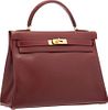 Hermes 32cm Rouge H Calf Box Leather Retourne Kelly Bag with Gold Hardware Very Good to Excellent Condition 12.5" Width x 9" Height x 4" Depth