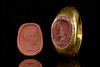 A ROMAN JASPER MERCURY INTAGLIO GOLD RING