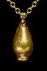 AN ANCIENT EGYPTIAN GOLD LOTUS BEAD