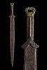 A SCYTHIAN ACINACES IRON SWORD WITH GRIFFIN HANDLE