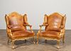 PAIR, ROCOCO-STYLE LEATHER CONFESSIONAL BERGERES