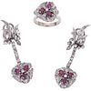 SET OF RING AND PAIR OF EARRINGS WITH RUBIES AND DIAMONDS IN PALLADIUM SILVER Oval cut rubies ~1.40 ct, 8x8 cut diamonds ~1.70 ct | JUEGO DE ANILLO Y 
