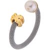 RING WITH CULTURED PEARL IN STEEL AND 18K YELLOW GOLD 1 Cream colored pearl. Weight: 2.2 g. Size: 9 ¼ | ANILLO CON PERLA CULTIVADA EN ACERO Y ORO AMAR