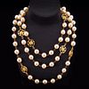 A CHANEL PEARL LONG CHAIN NECKLACE