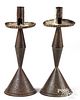 Pair of weighted tin candlesticks, 19th c.