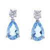 A pair of 18ct gold aquamarine and diamond earrings. Each designed as a pear-shape aquamarine, suspe