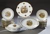 Thirty Piece Porcelain Partial Dinner Service, with gilt rims and a tracery border, around game bird transfer decoration, consisting of 16 dinner plat