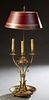 French Style Tole and Bronze Bouillotte Lamp, 20th c., the adjustable magenta and gilt decorated tole shade on a square support, over three scrolled e