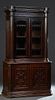 English Carved Oak Bookcase Cupboard, late 19th c. the spindled crown over double setback glazed doors, flanked by engaged hexagonal pilasters, on a c