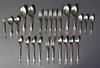 Twenty-Six Piece Group of Sterling Silver Flatware, by Wallace, in the "La Reine" pattern, 1921, consisting of 8 iced tea spoons, 6 luncheon forks, 2 