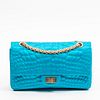 Chanel Classic Double Flap Shoulder Bag, c. 2007, in electric blue satin crocodile stitched canvas with golden hardware, the interior lined in a match